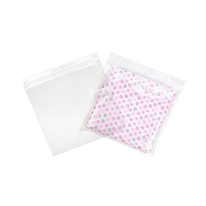 Grip Seal Bags with Hang hole 21.5x21.5cm Crystal Clear PP 50 micron, showing the bag filled with a product and empty