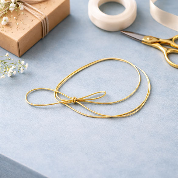 Nastro decorativo oro metallizzato 40.5cm (50 pezzi) [16MG]