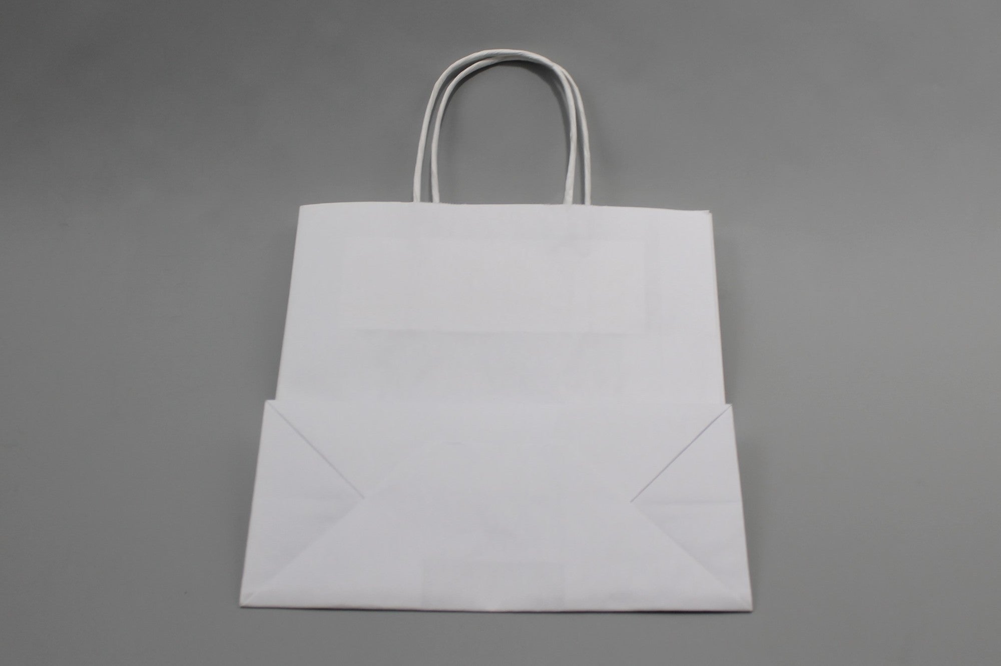 Shopper di carta bianca 26x12x35cm Kraft 90 g/gm con manici cordino (50 pezzi) [PAMW2635]