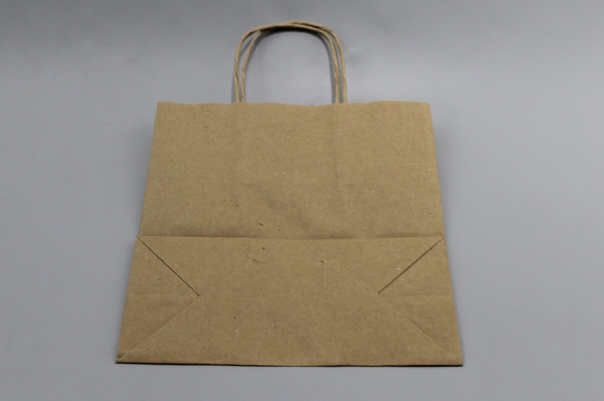 Shopper di carta marrone 18x8x22cm Kraft 90 grammi con manici cordino (50 pezzi) [PAMB1822]