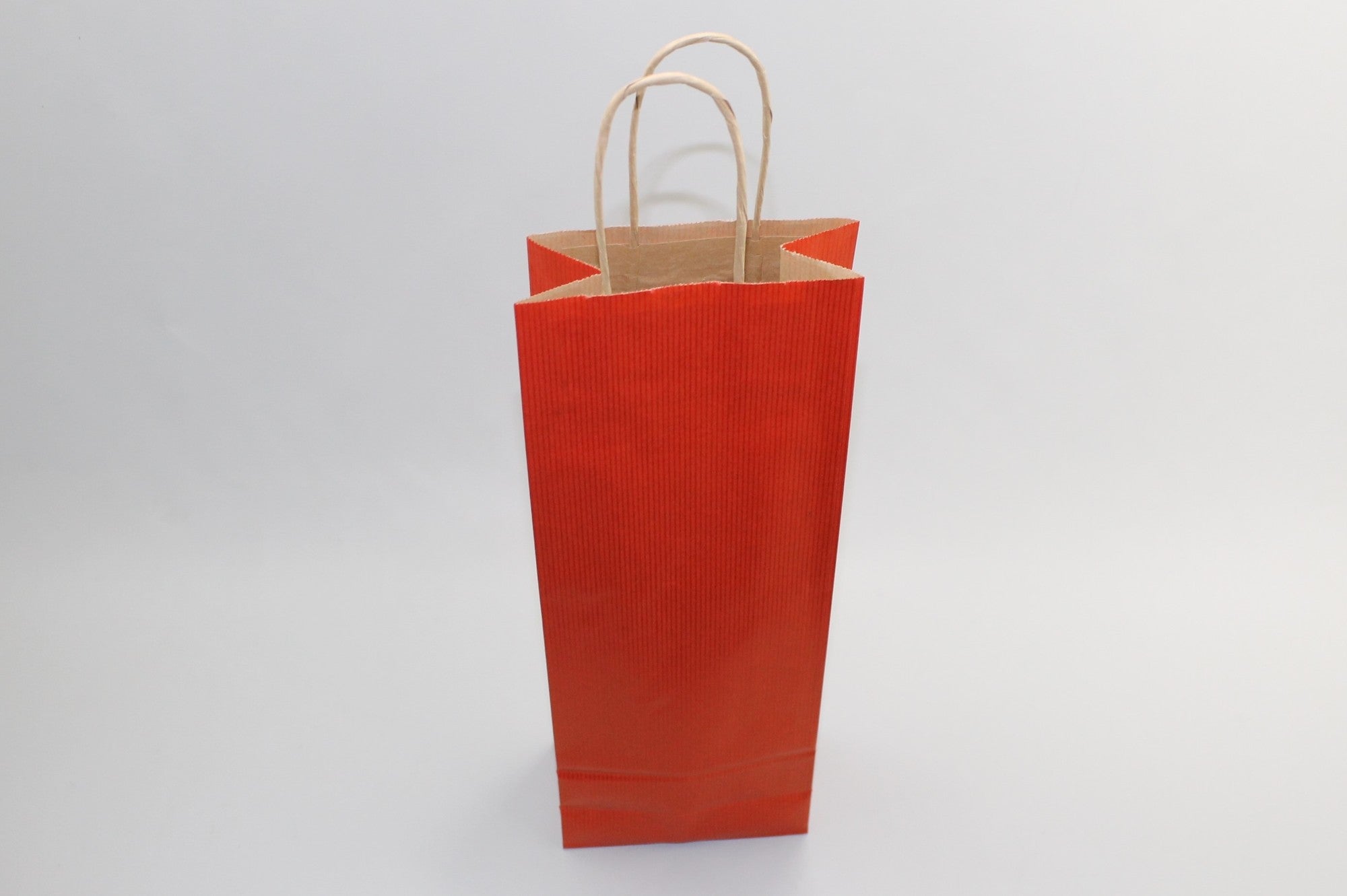 Shopper per bottiglie color rosso scuro 14x8x39cm Kraft 110 g/m² (50 pezzi) [PAWF1439DKR]